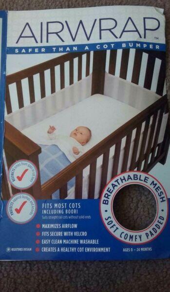 Air wrap to wrap around cot like bumper