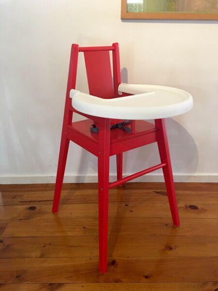Blames IKEA high chair in red