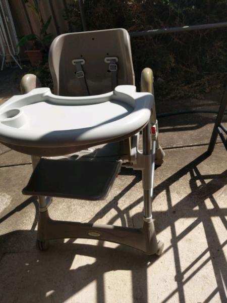 High chair In Goof Condition, foldable