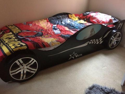 Child's black car bed
