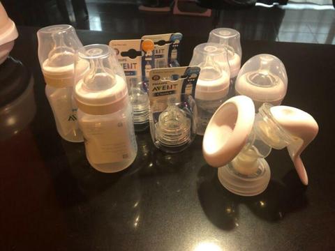 Brand new Avent baby bottles and a manual pump for sale