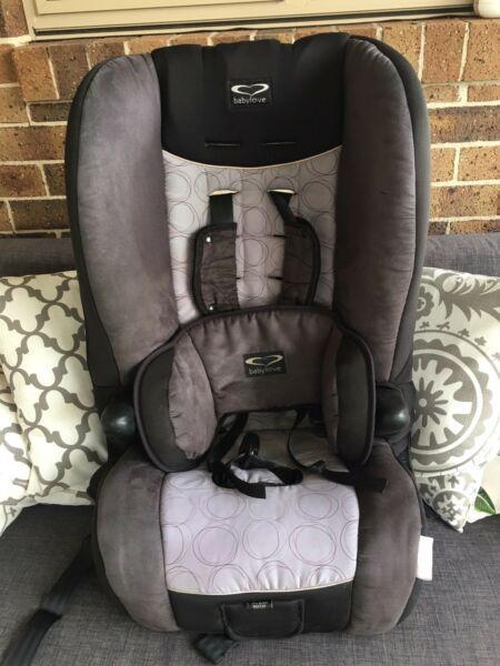Baby love booster seat harnessed