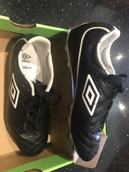 New Umbro kids soccer boots - size US 6. Nike shin protectors extra