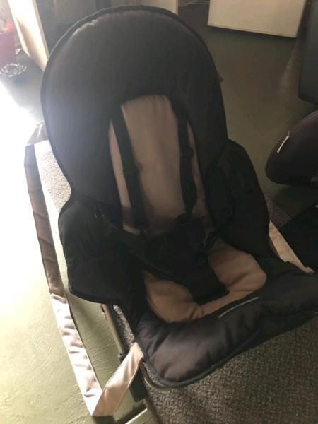 Baby seat ,carrier and rocker all in one