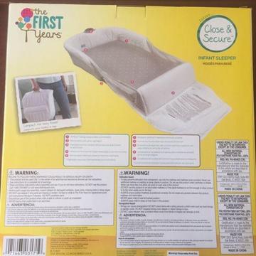 The first years infant sleeper bassinet