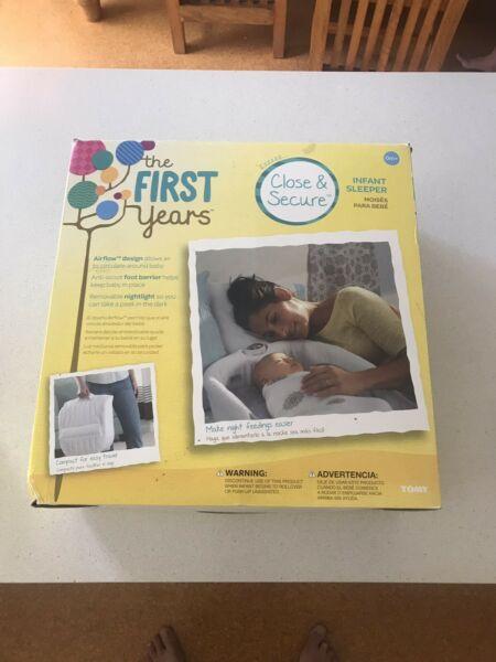 First years close and secure infant sleeper
