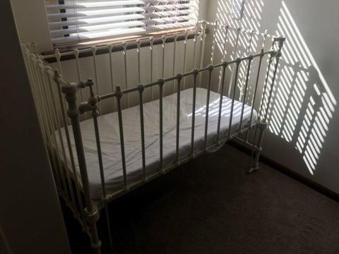 Antique wrought iron cot