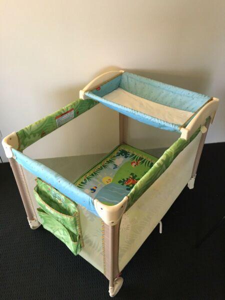 This Fisher-Price Rainforest 3-In-1 Travel Cot