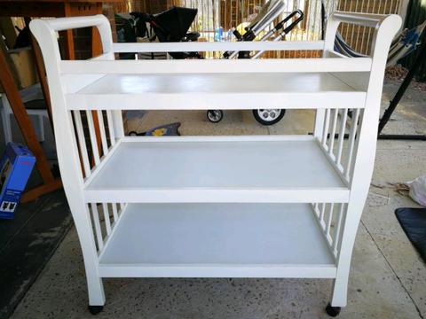 White sleigh cot and matching change table