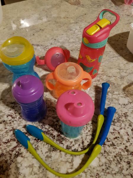 Assortment of baby kid child bottles, boon infant teething tether