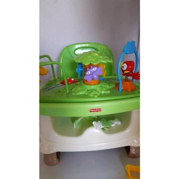 Fisher price portable feeding chair with table attachments