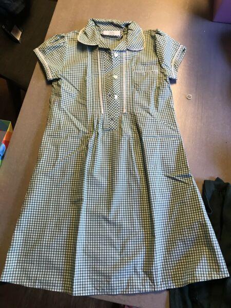Primary school dress size 6. Never worn